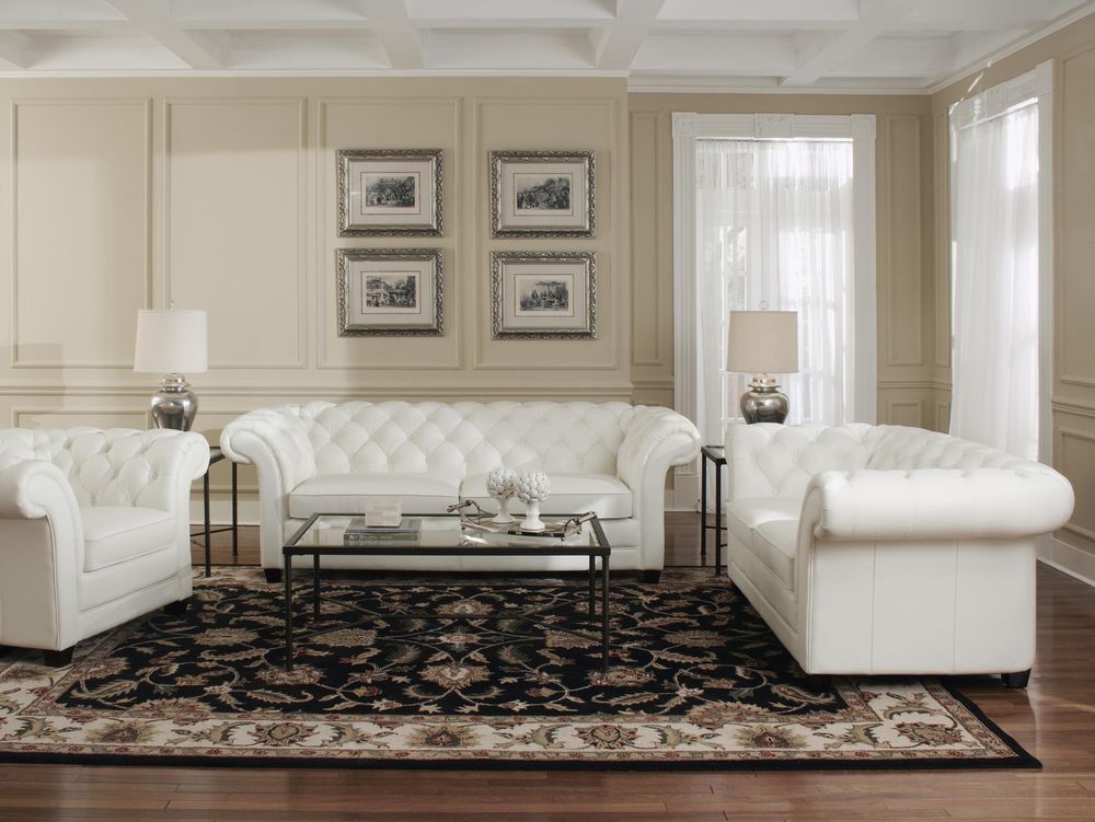 white leather tufted sofa